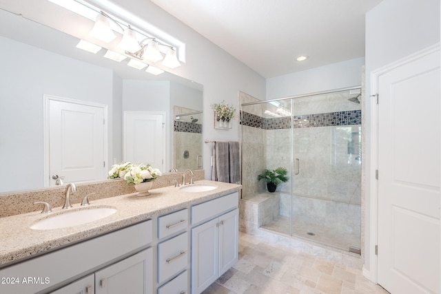 bathroom featuring vanity and walk in shower