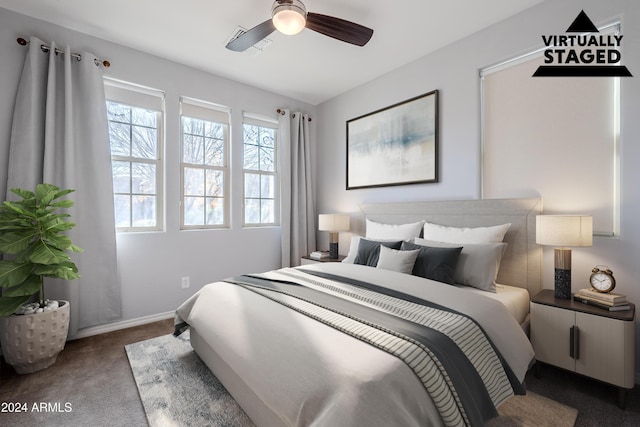 carpeted bedroom featuring ceiling fan