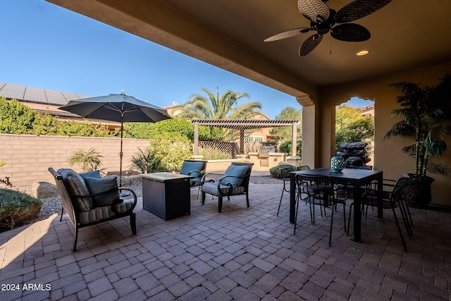 view of patio featuring ceiling fan, outdoor lounge area, a pergola, and area for grilling