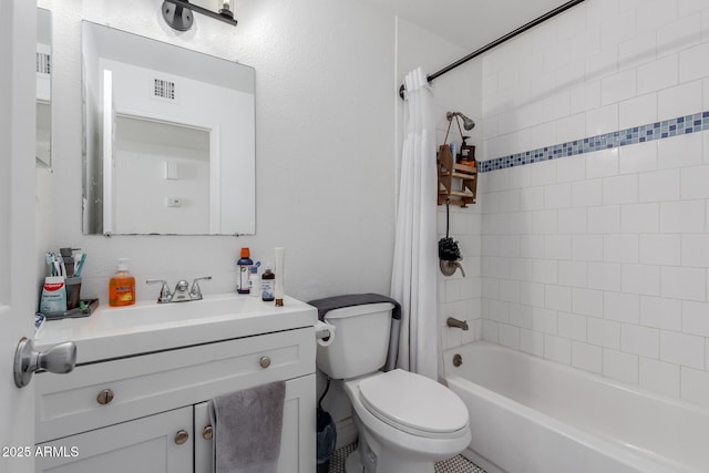 full bathroom with visible vents, shower / bath combo, toilet, and vanity