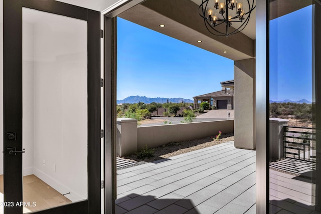 wooden terrace with a mountain view