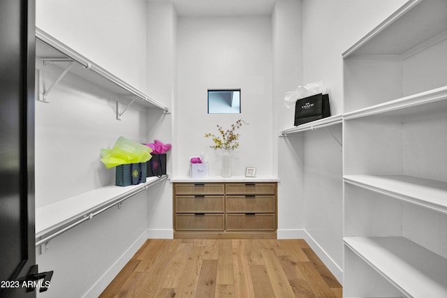 walk in closet featuring light wood-type flooring