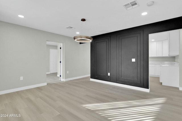 unfurnished bedroom featuring light hardwood / wood-style flooring