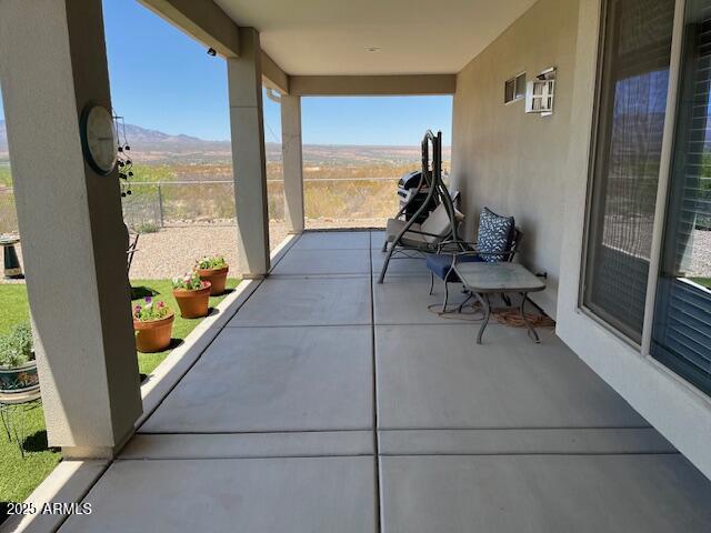 1067 N Jacobs Rd, Saint David, AZ 85630 - view of patio / terrace with a mountain view