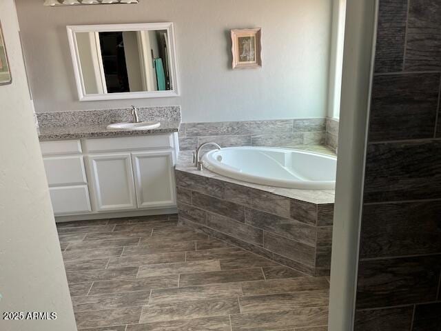 1067 N Jacobs Rd, Saint David, AZ 85630 - bathroom with vanity and a bath