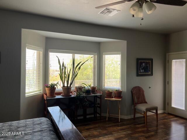 1067 N Jacobs Rd, Saint David, AZ 85630 - bedroom featuring wood finished floors, baseboards, and a ceiling fan
