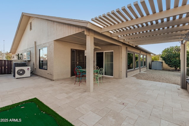 view of patio / terrace with fence, ac unit, a ceiling fan, and a pergola