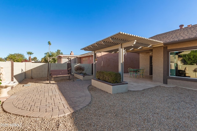 view of patio with a fenced backyard and a pergola
