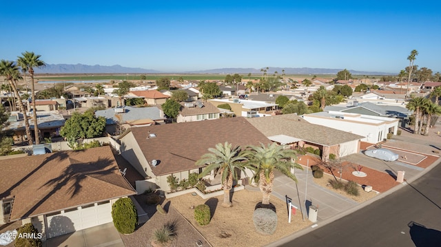 drone / aerial view with a residential view and a mountain view