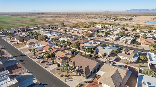 drone / aerial view with a residential view and a mountain view