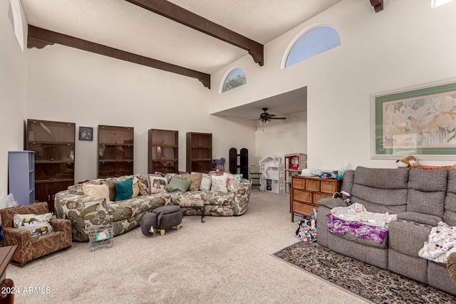 living room featuring ceiling fan, beam ceiling, carpet floors, and high vaulted ceiling