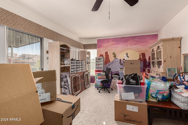 miscellaneous room featuring carpet flooring, ornamental molding, ceiling fan, and a healthy amount of sunlight