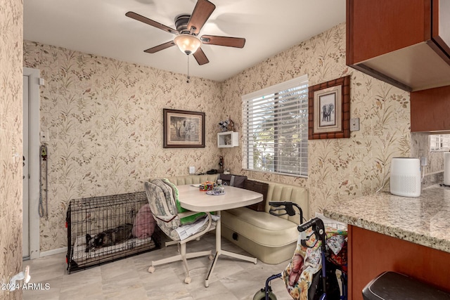 dining area featuring breakfast area and ceiling fan