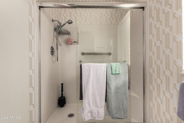 bathroom featuring an enclosed shower