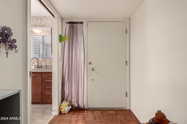 entryway featuring light parquet floors