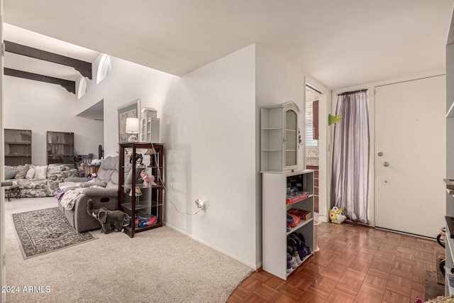 living room featuring vaulted ceiling and parquet flooring