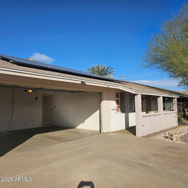 view of front of house featuring a carport