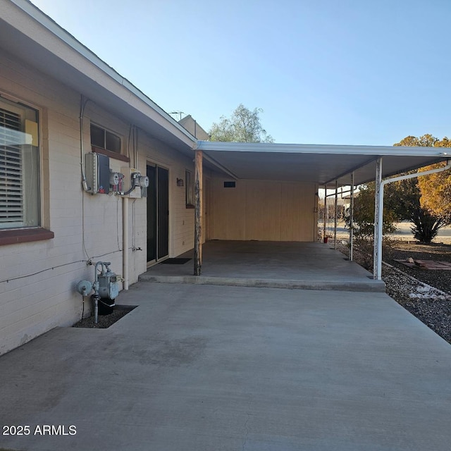 exterior space featuring a carport