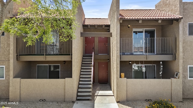 view of property with stairway