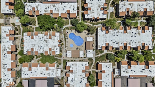 aerial view of property's location featuring a pool