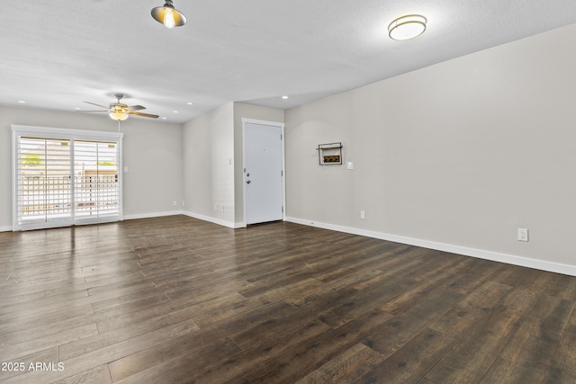 unfurnished room with a ceiling fan, dark wood-style floors, baseboards, and recessed lighting