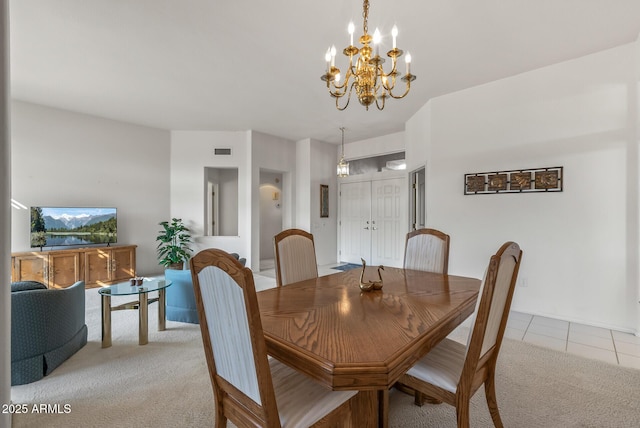 dining area with light tile patterned flooring, visible vents, light colored carpet, and a notable chandelier