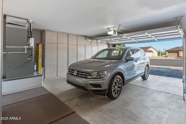 garage with heating unit and a garage door opener