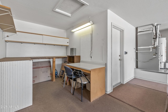 basement featuring heating unit, water heater, and carpet floors