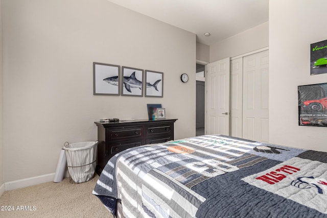 carpeted bedroom with a closet