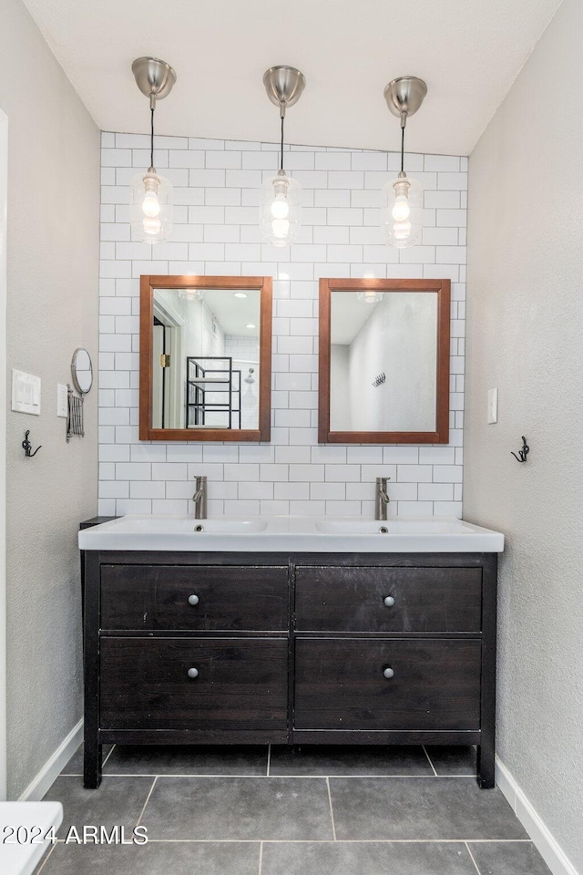 bathroom featuring tile patterned floors and vanity