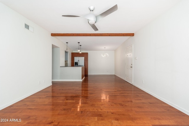 interior space featuring beam ceiling, ceiling fan, and hardwood / wood-style floors