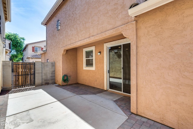 9 N 87th Ln N, Tolleson, AZ 85353 - view of patio with a gate