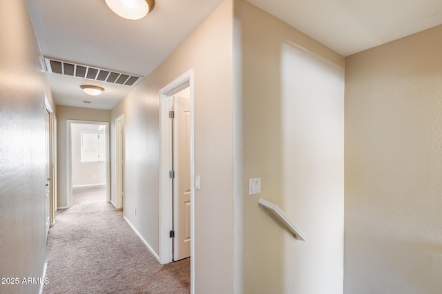 9 N 87th Ln N, Tolleson, AZ 85353 - hallway with carpet and baseboards