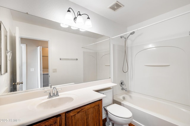 9 N 87th Ln N, Tolleson, AZ 85353 - bathroom featuring shower / washtub combination, vanity, and toilet