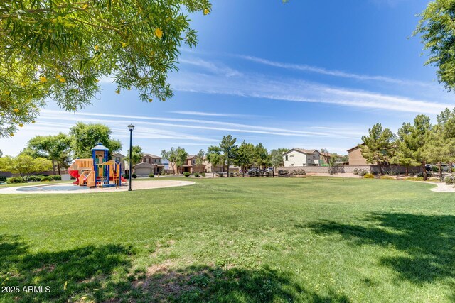 9 N 87th Ln N, Tolleson, AZ 85353 - view of grassy yard with a residential view