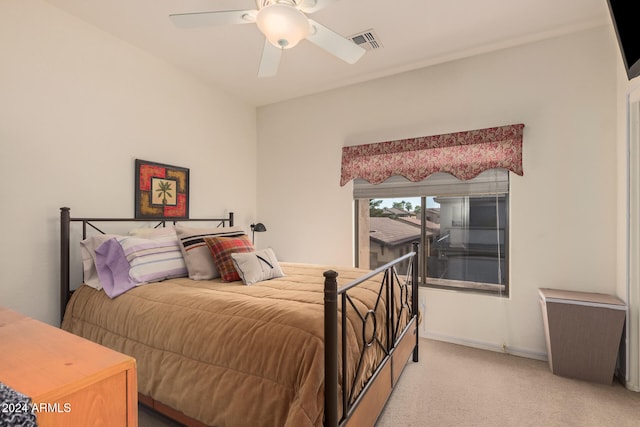 carpeted bedroom with ceiling fan