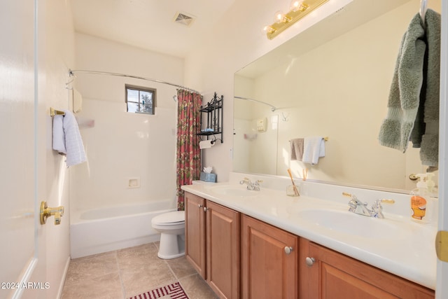 full bathroom featuring tile patterned flooring, vanity, toilet, and shower / tub combo