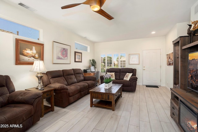 15790 W Arrowhead Dr, Surprise, AZ 85374 - living area with light wood-style flooring, ceiling fan, and recessed lighting