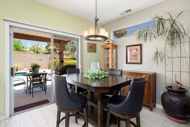 15790 W Arrowhead Dr, Surprise, AZ 85374 - dining space featuring healthy amount of natural light and a chandelier