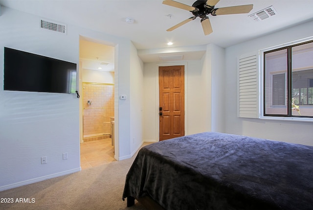 bedroom featuring light colored carpet and ceiling fan