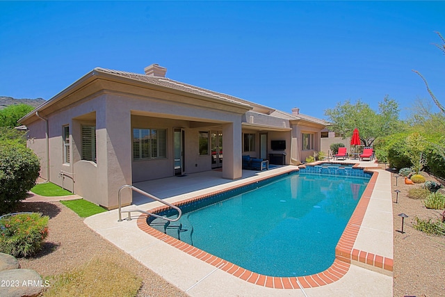 view of pool with a patio area