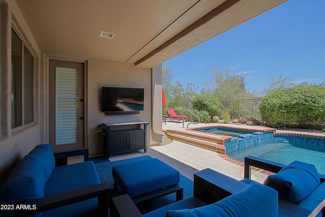 view of patio / terrace with a fenced in pool and an outdoor hangout area