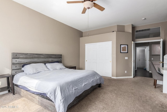 carpeted bedroom featuring ceiling fan