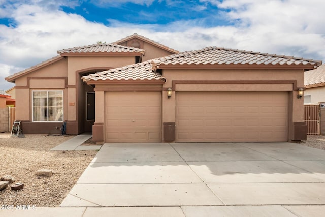 view of front of property with a garage