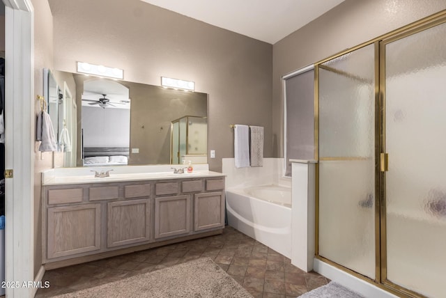 bathroom featuring independent shower and bath, vanity, and ceiling fan