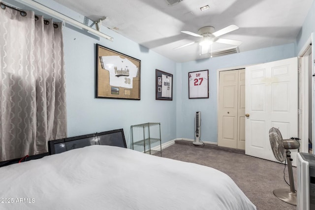 carpeted bedroom featuring ceiling fan