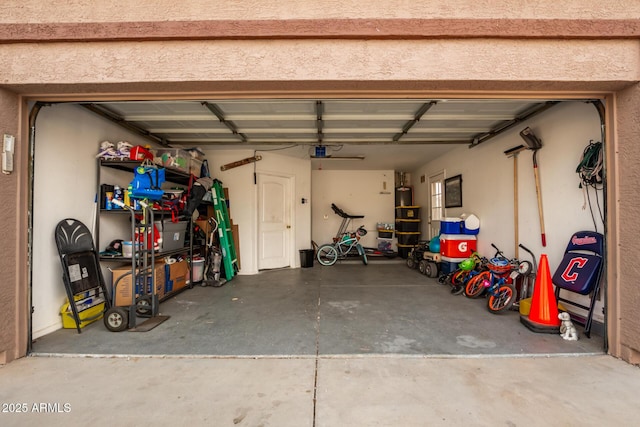 garage featuring a garage door opener