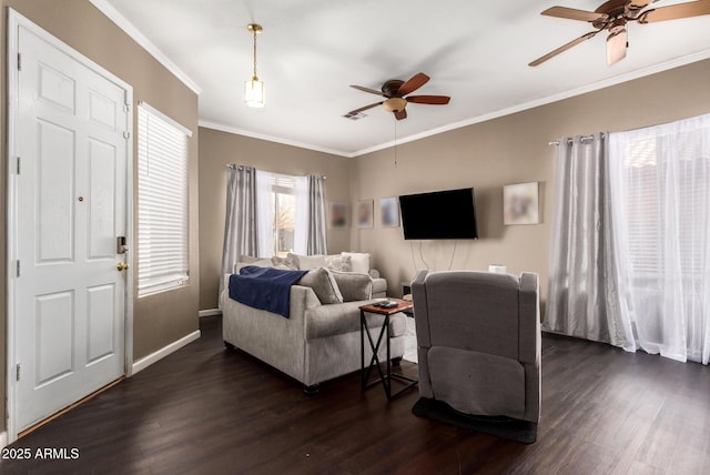 living room featuring crown molding, dark hardwood / wood-style floors, and ceiling fan