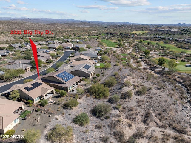 birds eye view of property with a residential view and a mountain view