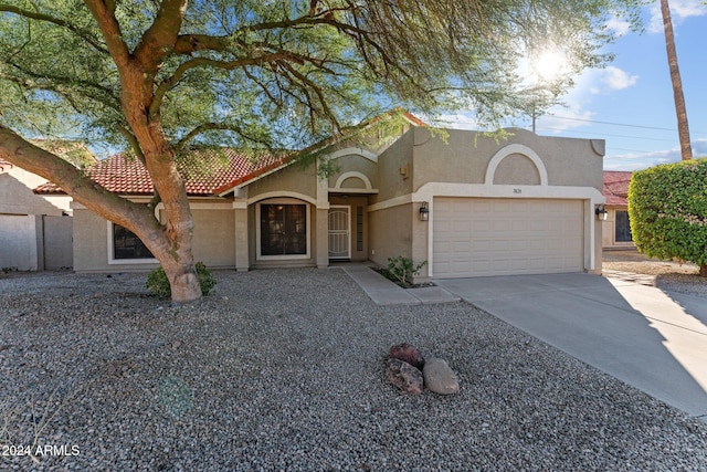 view of front of property with a garage